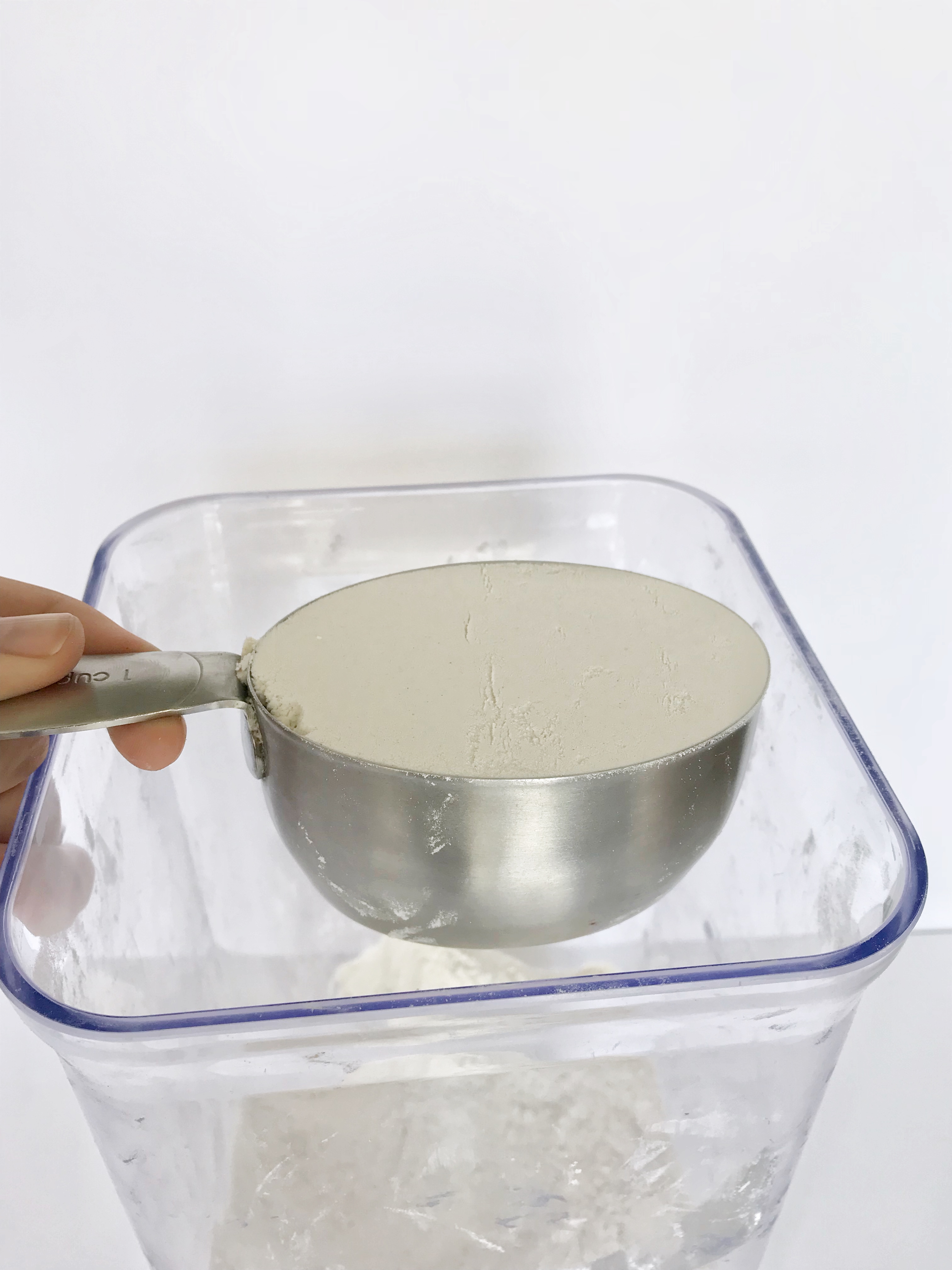 scrape flour back into container