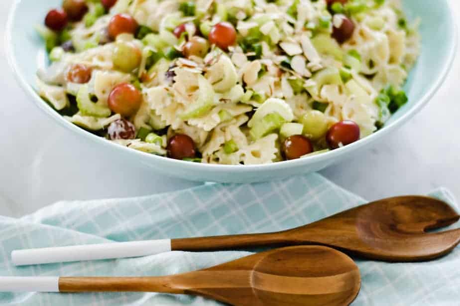 Bow tie pasta salad tossed with lemon, tarragon dressing, grapes, chicken, almonds, celery and green onion.