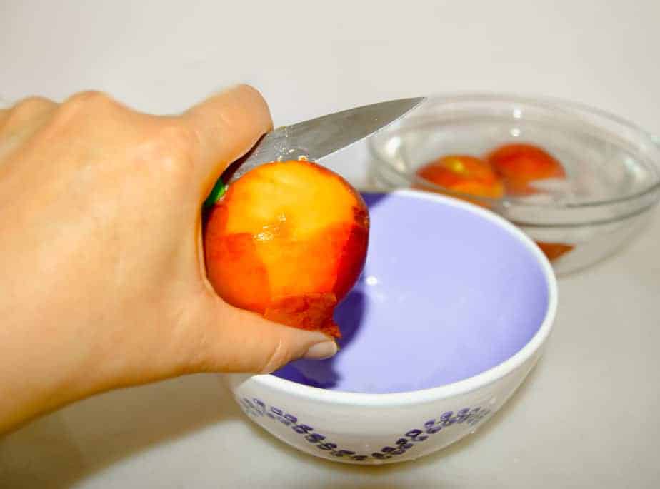 peeling fresh peaches