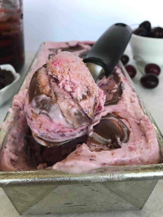 ice cream scoop with cherry chocolate ice cream