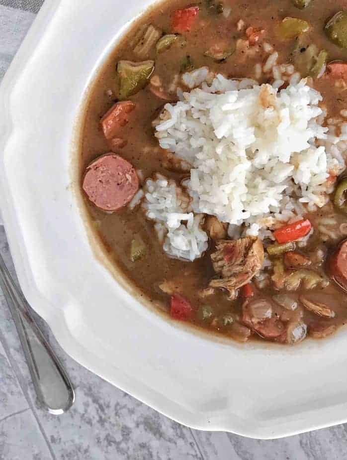 close up of chicken and sausage creole gumbo with white rice