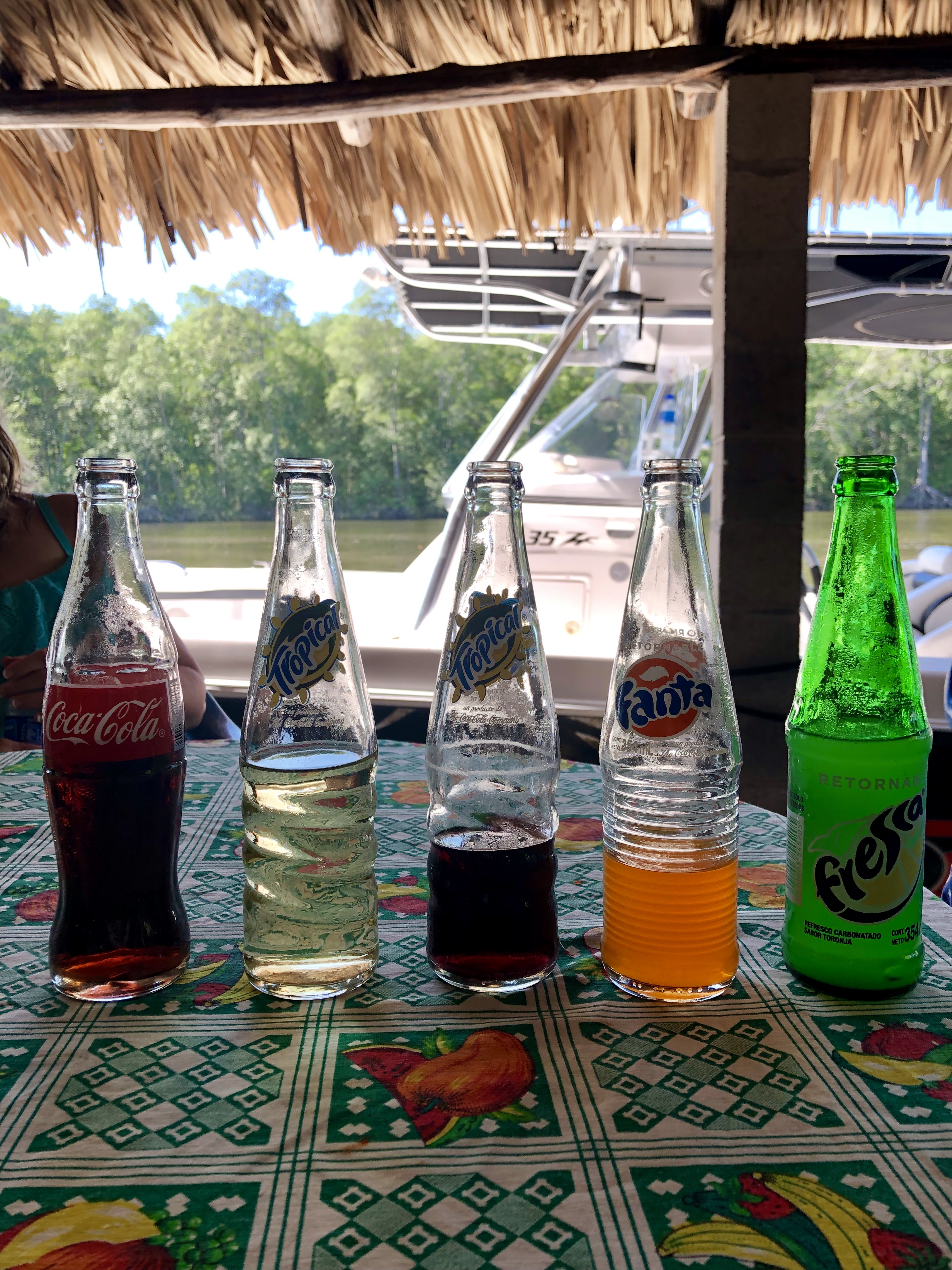 soda bottles sitting on table