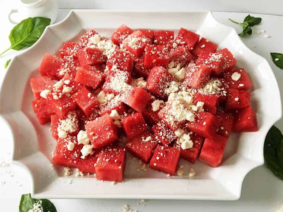 plater of watermelon chunks sprinkled with feta cheese
