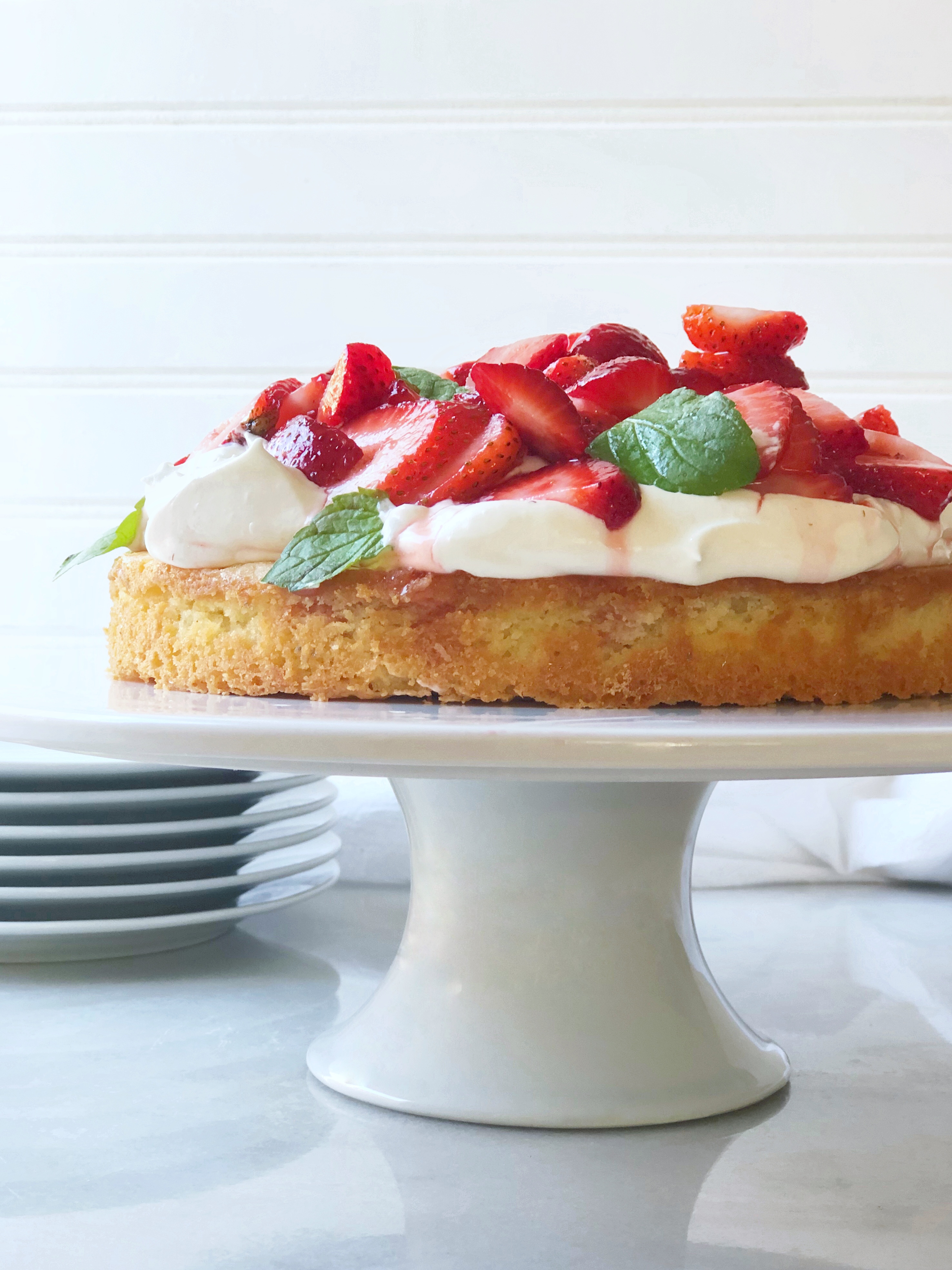 Strawberry shortbread cake with fresh strawberries and whipped cream