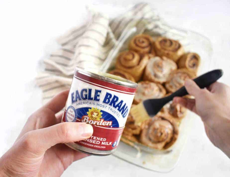 baste the gingerbread cinnamon rolls with sweetened condensed milk