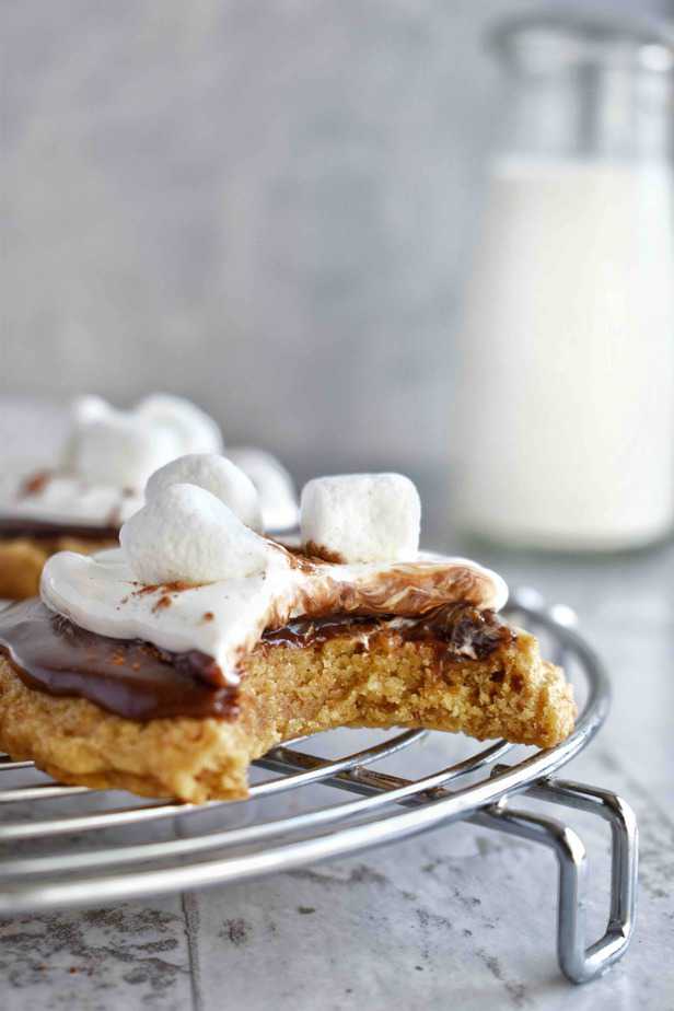 s'more cookie with bite out of it and milk bottle in background