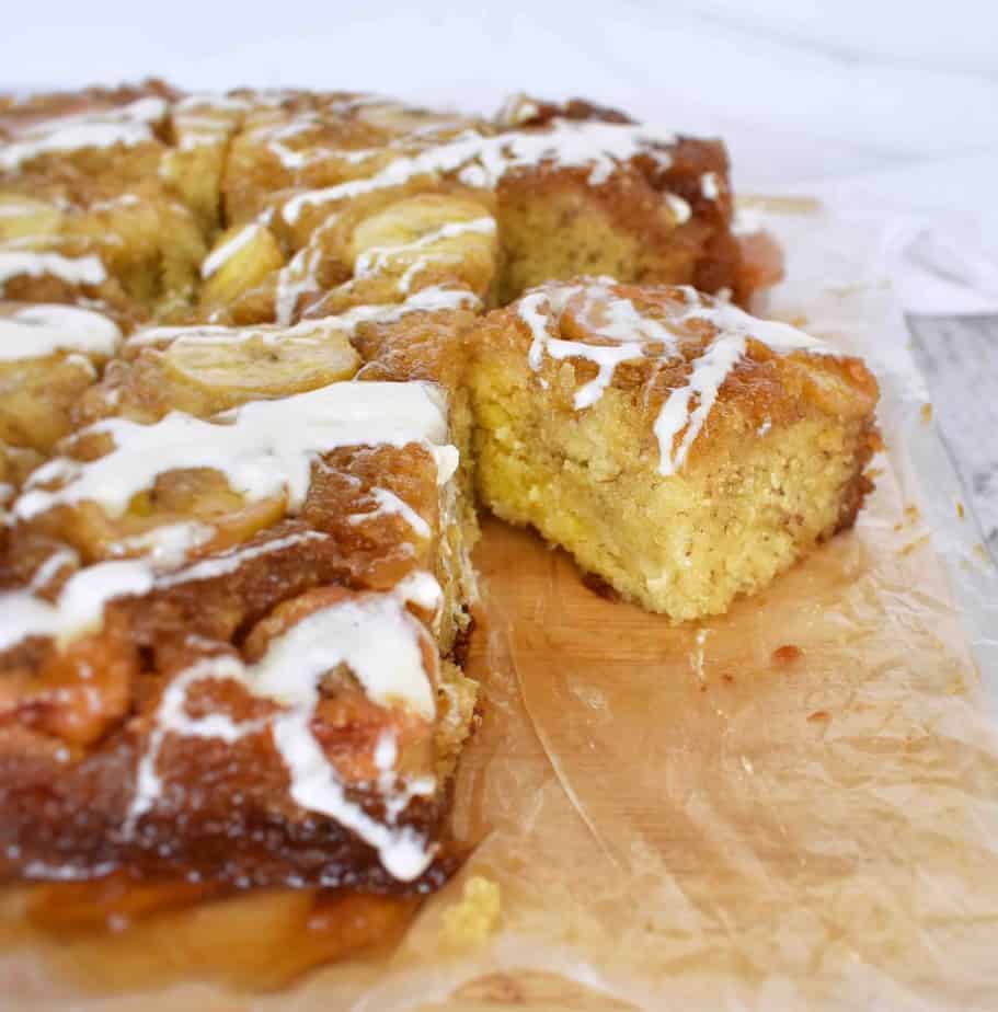 slices of banana upside down cake with cream cheese glaze