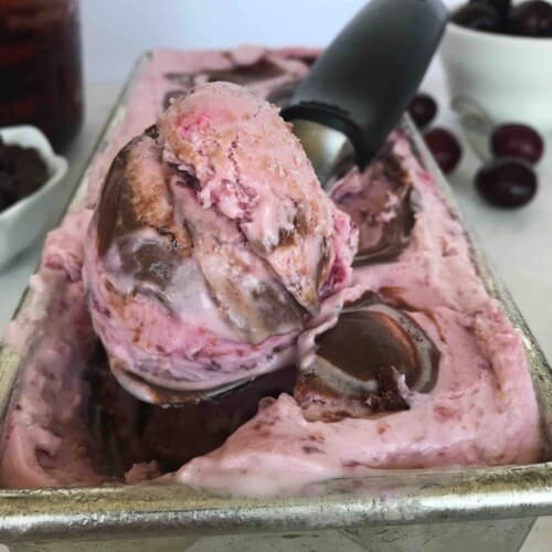 ice cream scoop with cherry chocolate ice cream