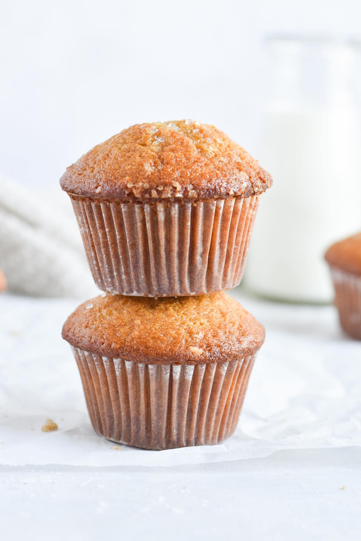 two muffins stacked on top of each other. 