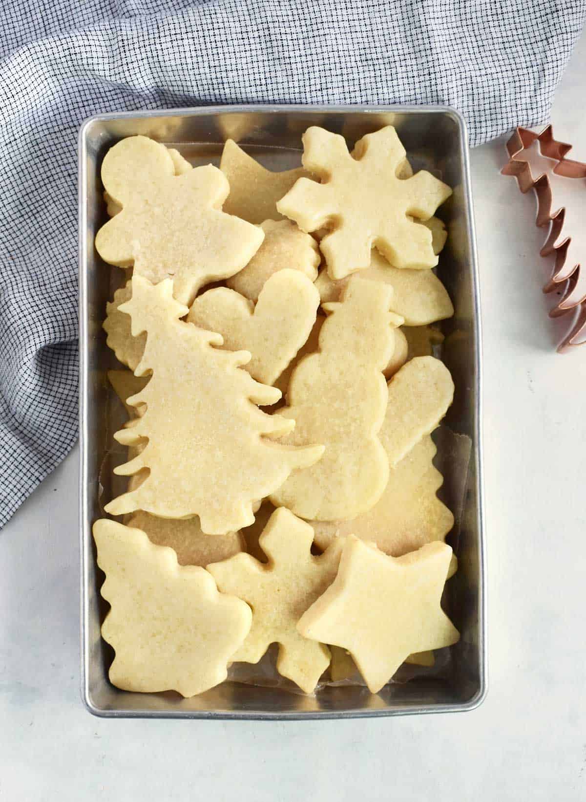 baked sugar cookies in metal tray. 