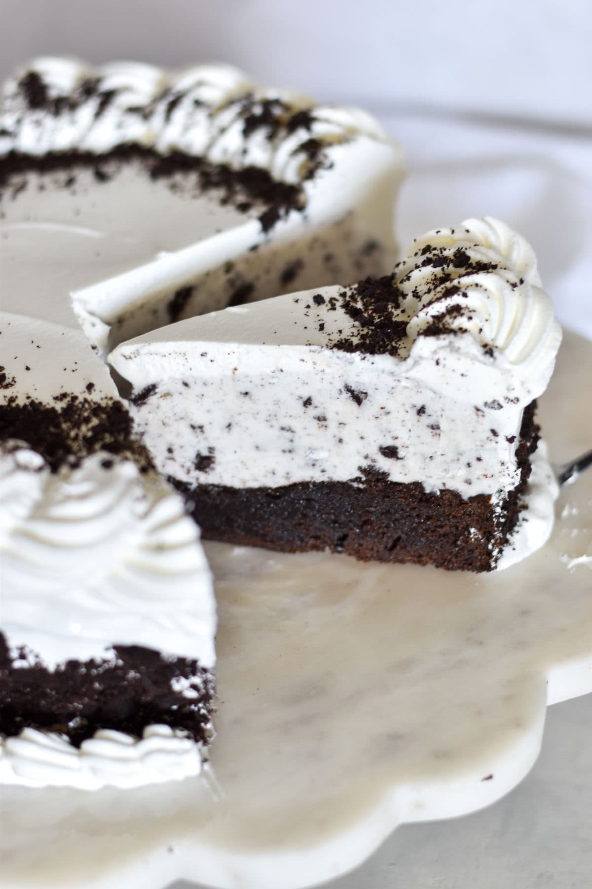 whole ice cream cake cut into slices.