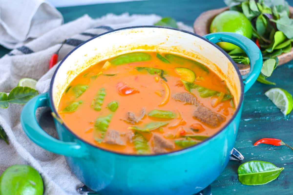 panang curry in large blue pot.