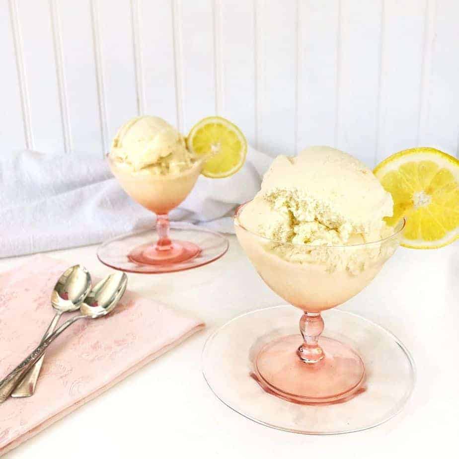 2 scoops of lemon orange banana homemade ice cream in pink glass goblets