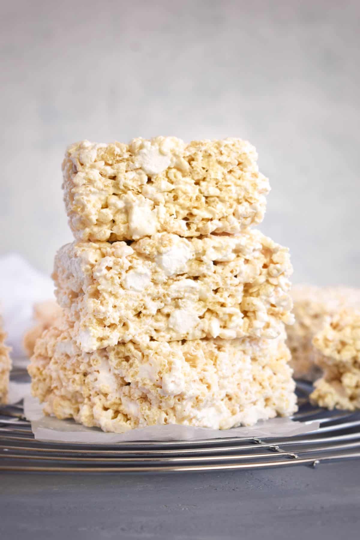 three rice krispie treats stack on top of each other. 