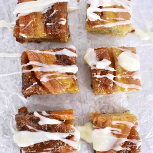 overhead shot of 6 slices of banana upside down cake with drizzle on it