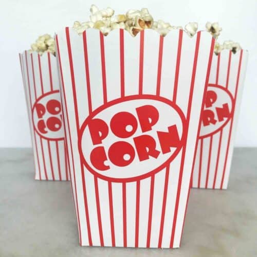 red and white striped popcorn containers in triangle shape.