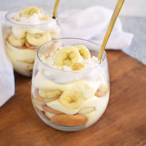 banana pudding layered in glass cup.
