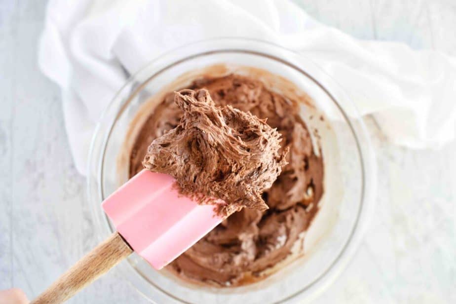 chocolate frosting on pink spatula