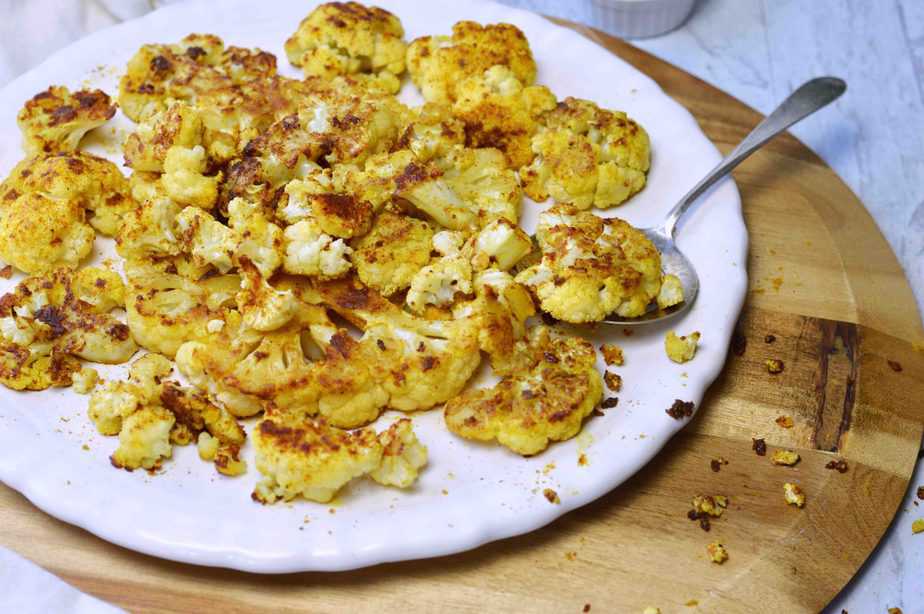 pieces of oven roasted curry cauliflower