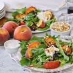 plated grilled peach and burrata salads.