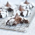 cookie on cooling rack with bite out of it.