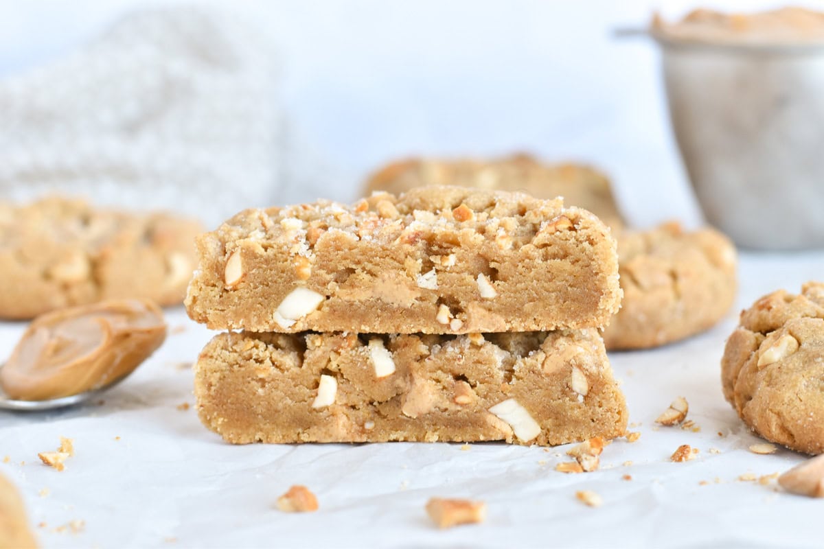 peanut butter cookie cut in half and stacked on top of each other.