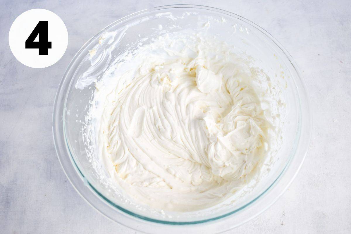 whipped white chocolate lemon cream in bowl.