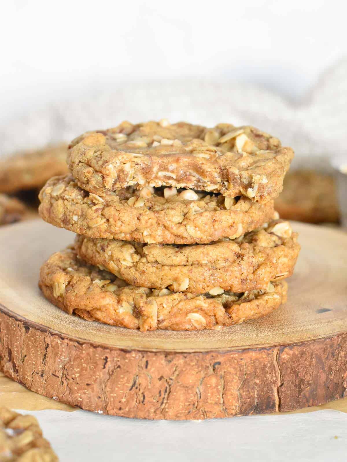 stack of cookies on wooden round.