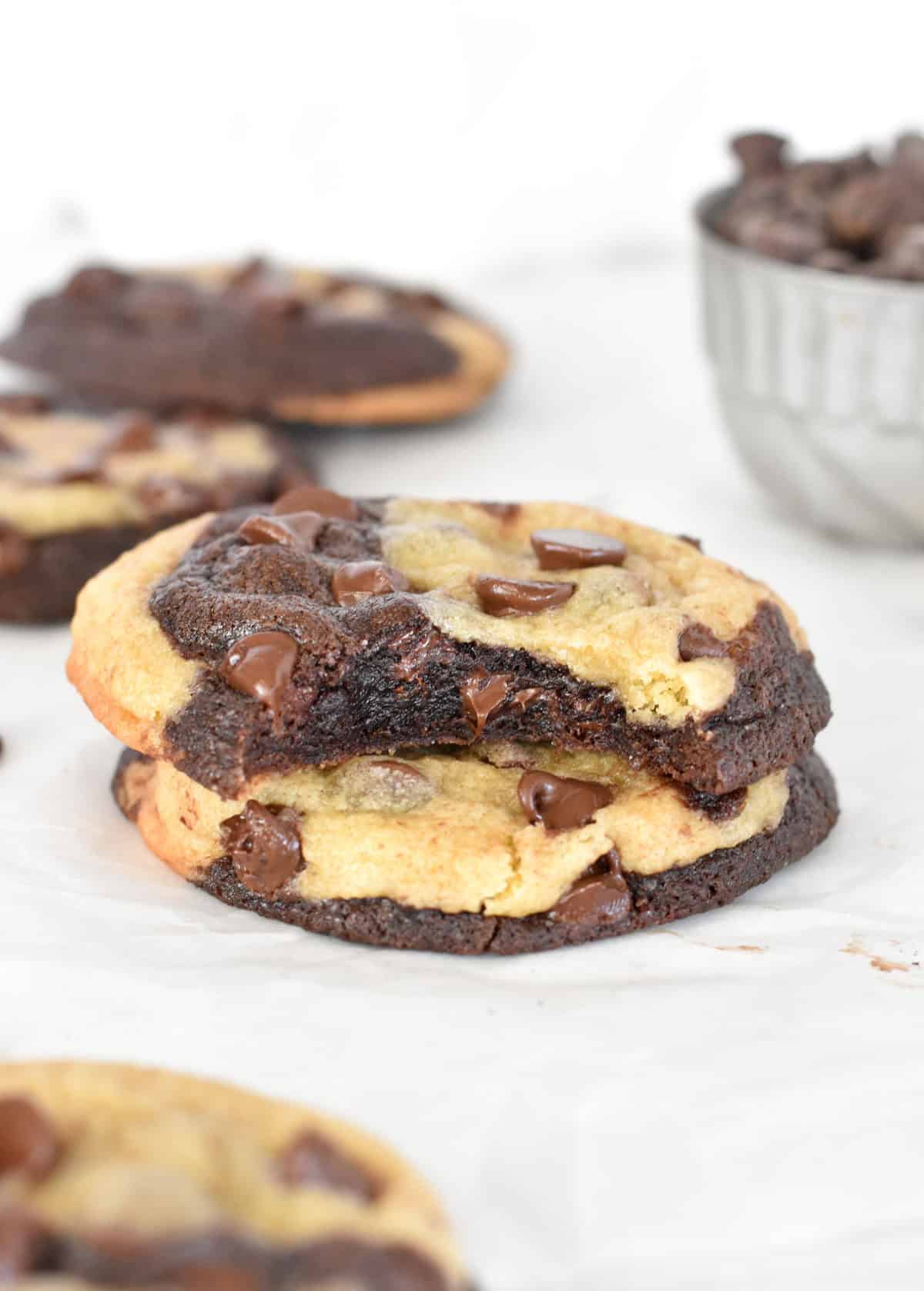 bitten cookie stacked on marble cookie.