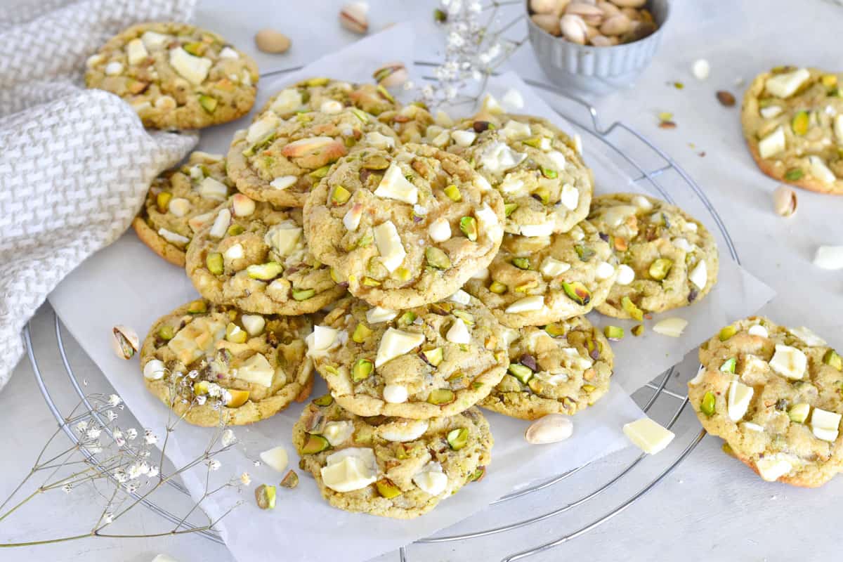 cookies piled on round wire cooling rack.