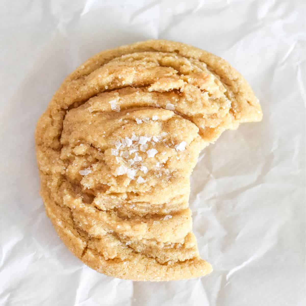 honey cookie with bite out of it.
